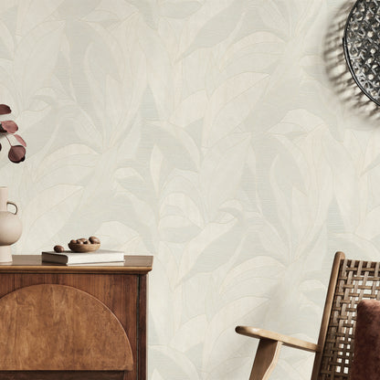 Beige wallpaper featuring a leafy pattern.