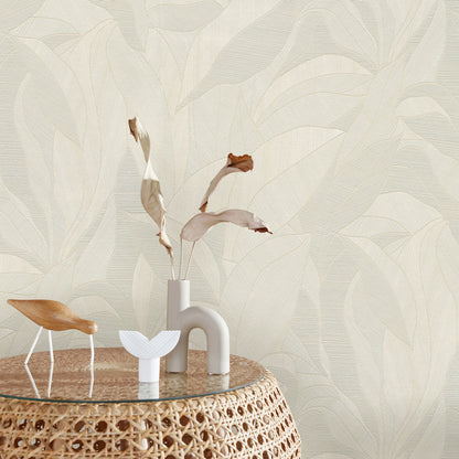Beige wallpaper with a leaf motif.
