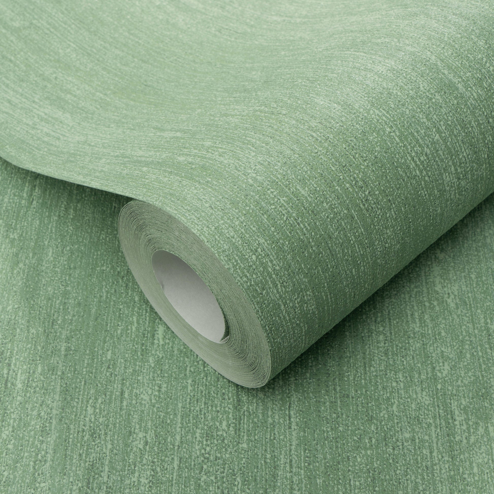 Green textured wallpaper roll with a subtle marled fabric-like finish and visible cardboard core.
