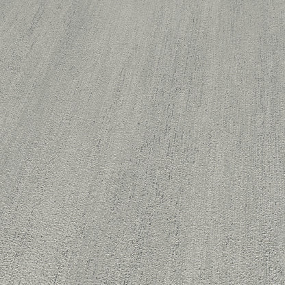 Taupe raised-texture wallpaper with a subtle pattern.