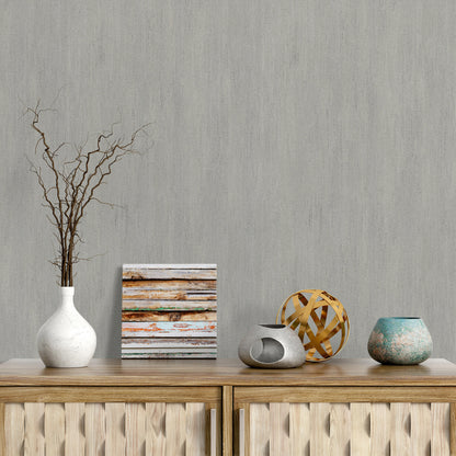 Taupe wallpaper with raised texture pattern; traditional taupe wallpaper close-up.