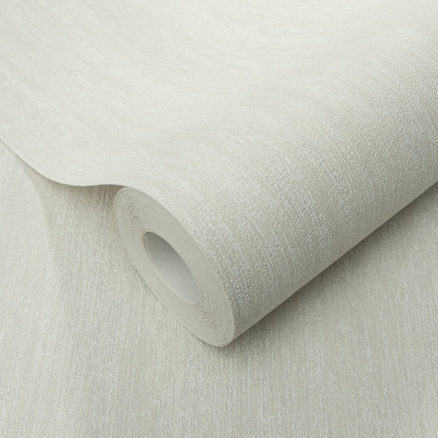 Cream textured wallpaper roll with subtle linen-like grain, rolled edge for interior decor.