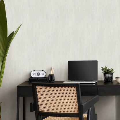 Off-white raised-texture wallpaper with a traditional pattern.