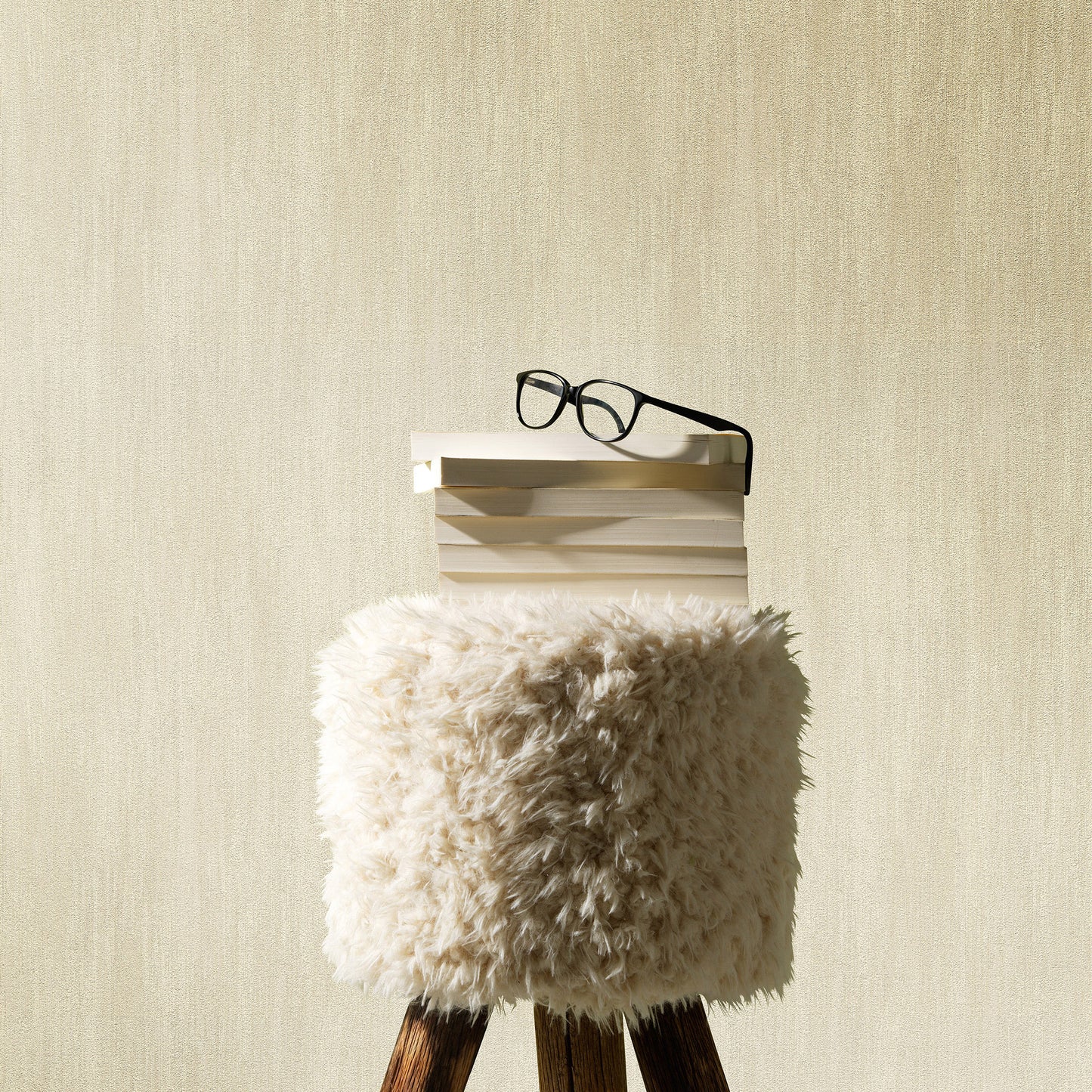 Beige raised-texture wallpaper with a traditional pattern.