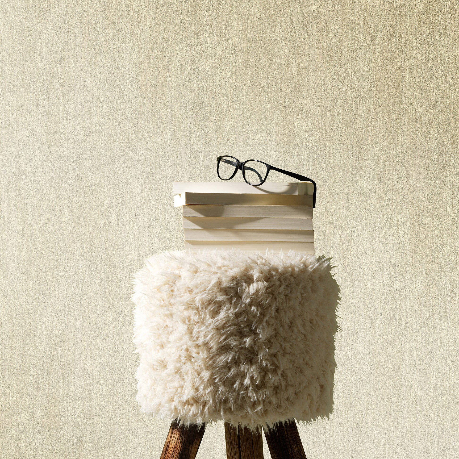 Beige raised-texture wallpaper with a traditional pattern.