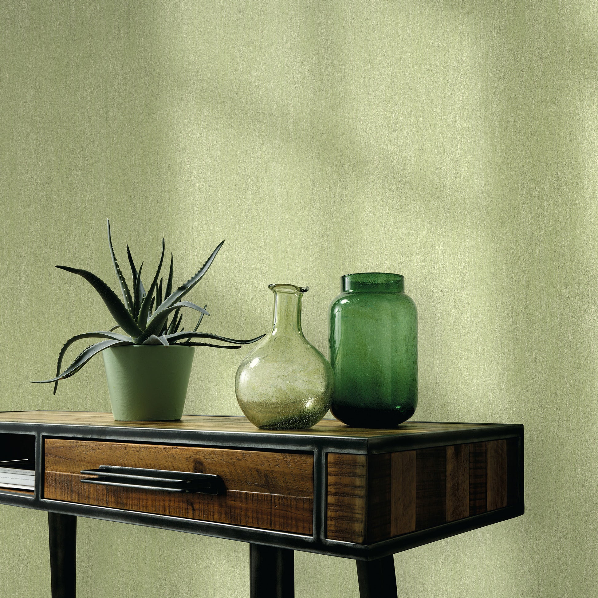 Traditional sage green wallpaper with raised texture pattern.