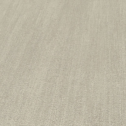 Brown wallpaper with raised texture and traditional pattern.