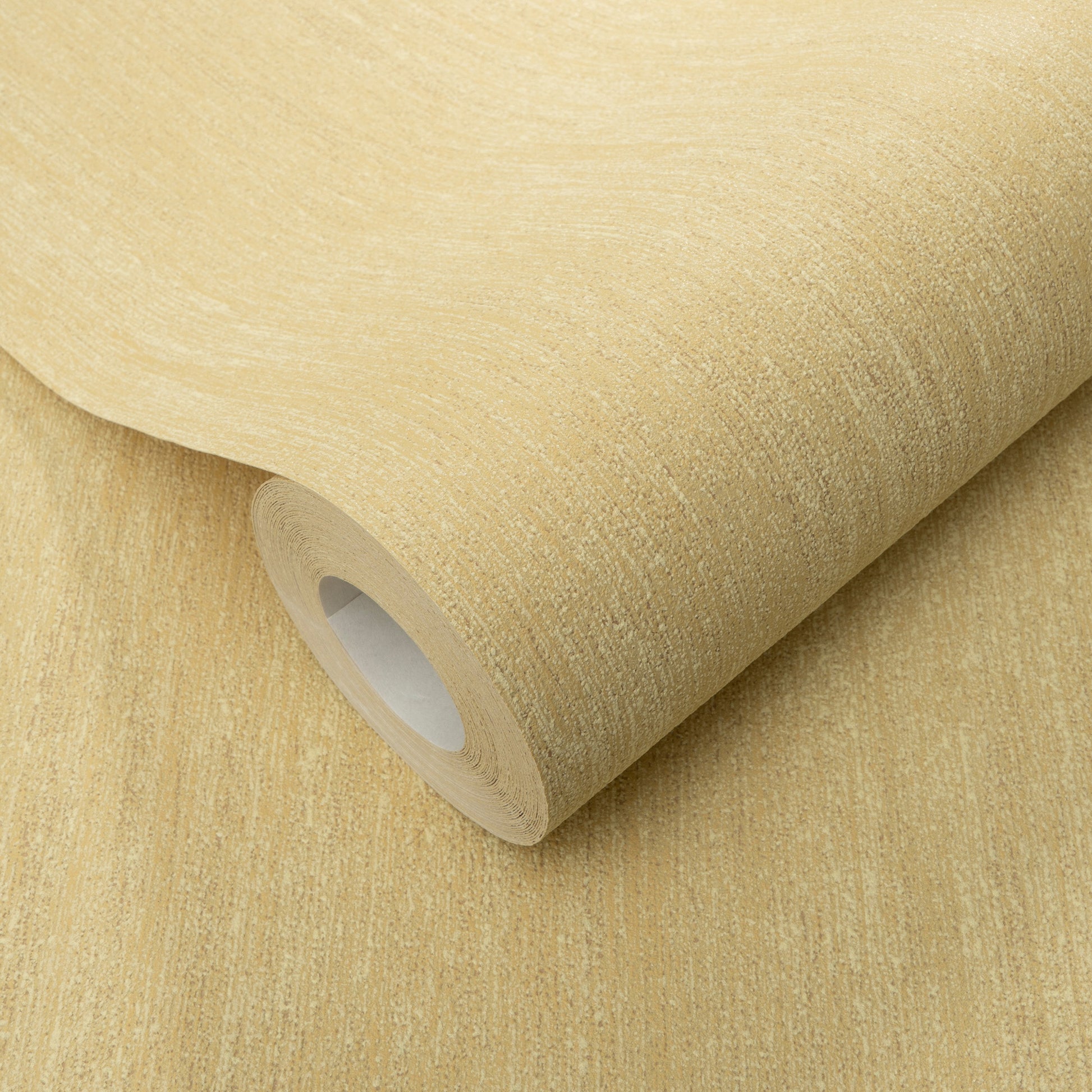 Beige textured wallpaper roll with subtle grain, partially unrolled showing the inner core.