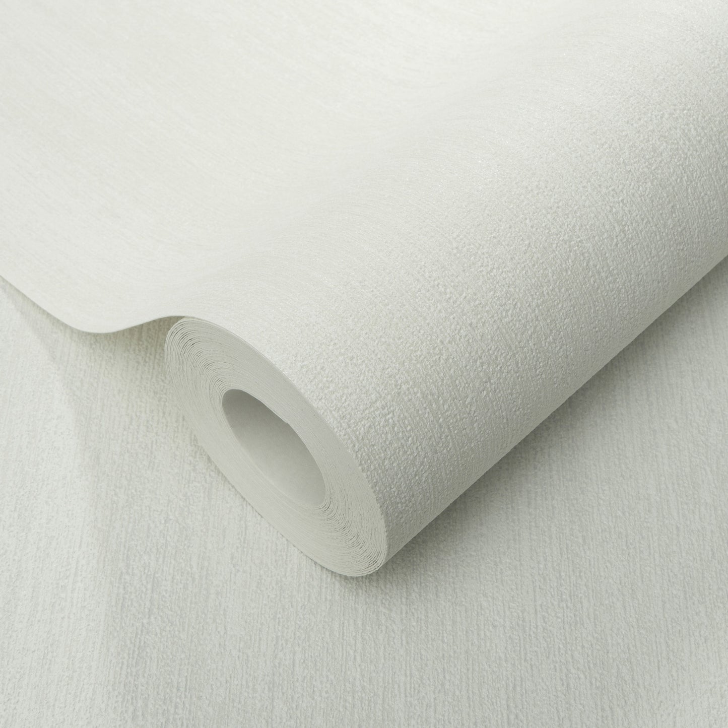 White textured wallpaper roll with a visible inner core, curved edge, subtle grainy surface.
