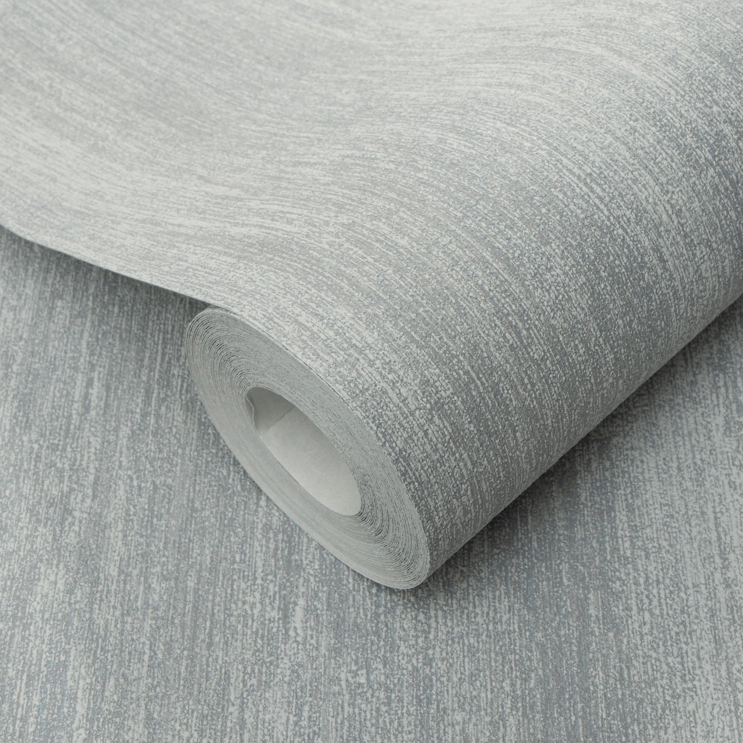 Roll of light gray textured wallpaper with subtle white streaks and brushed pattern.