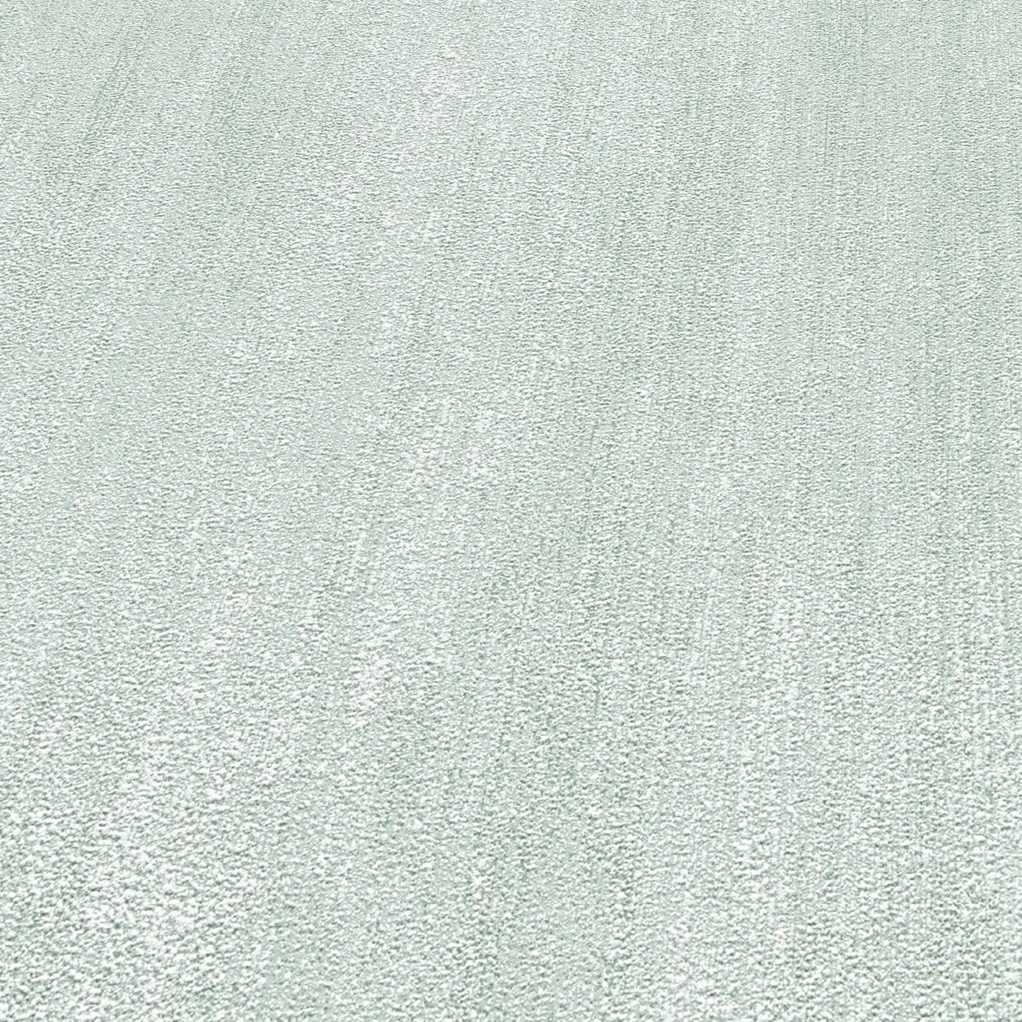 Light gray textured rug close-up with soft looped pile and subtle diagonal pattern.