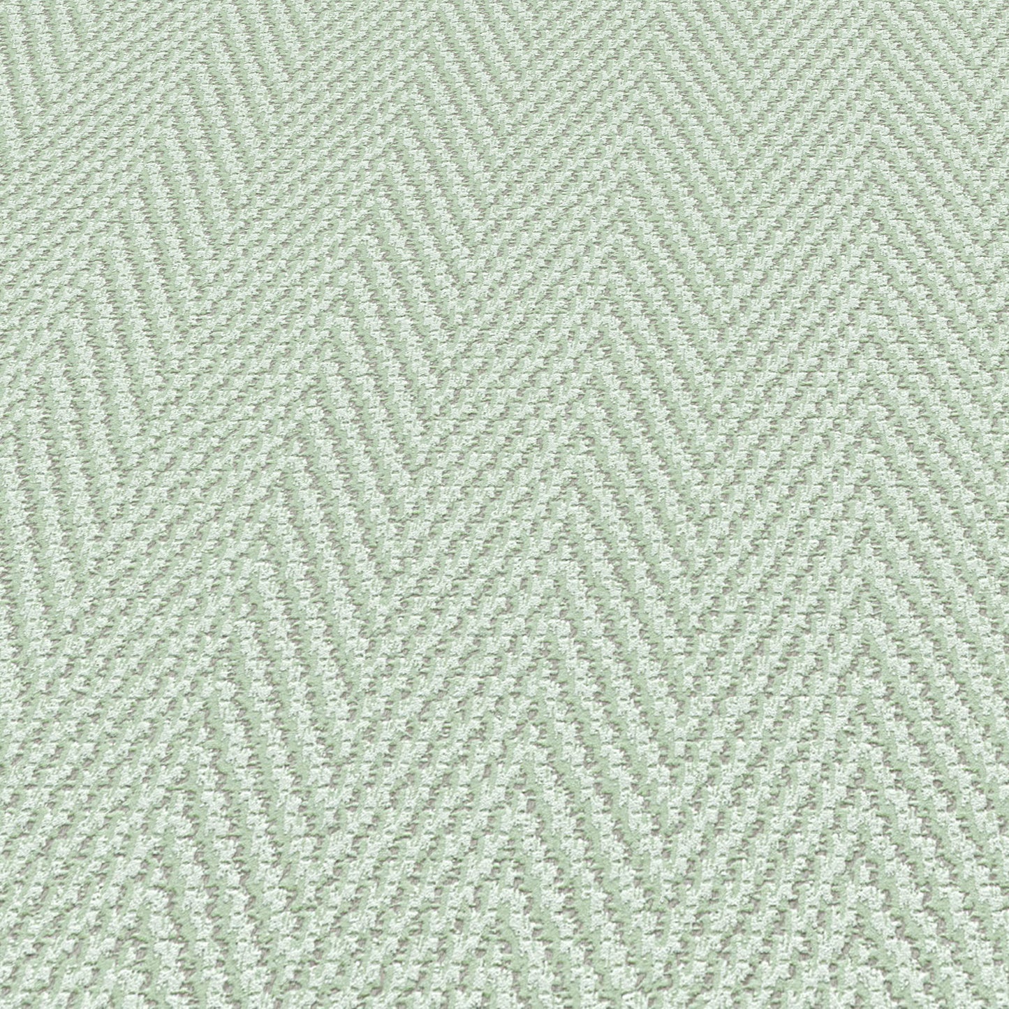 Light sage-green wallpaper with a subtle chevron stripe pattern and subtle texture.