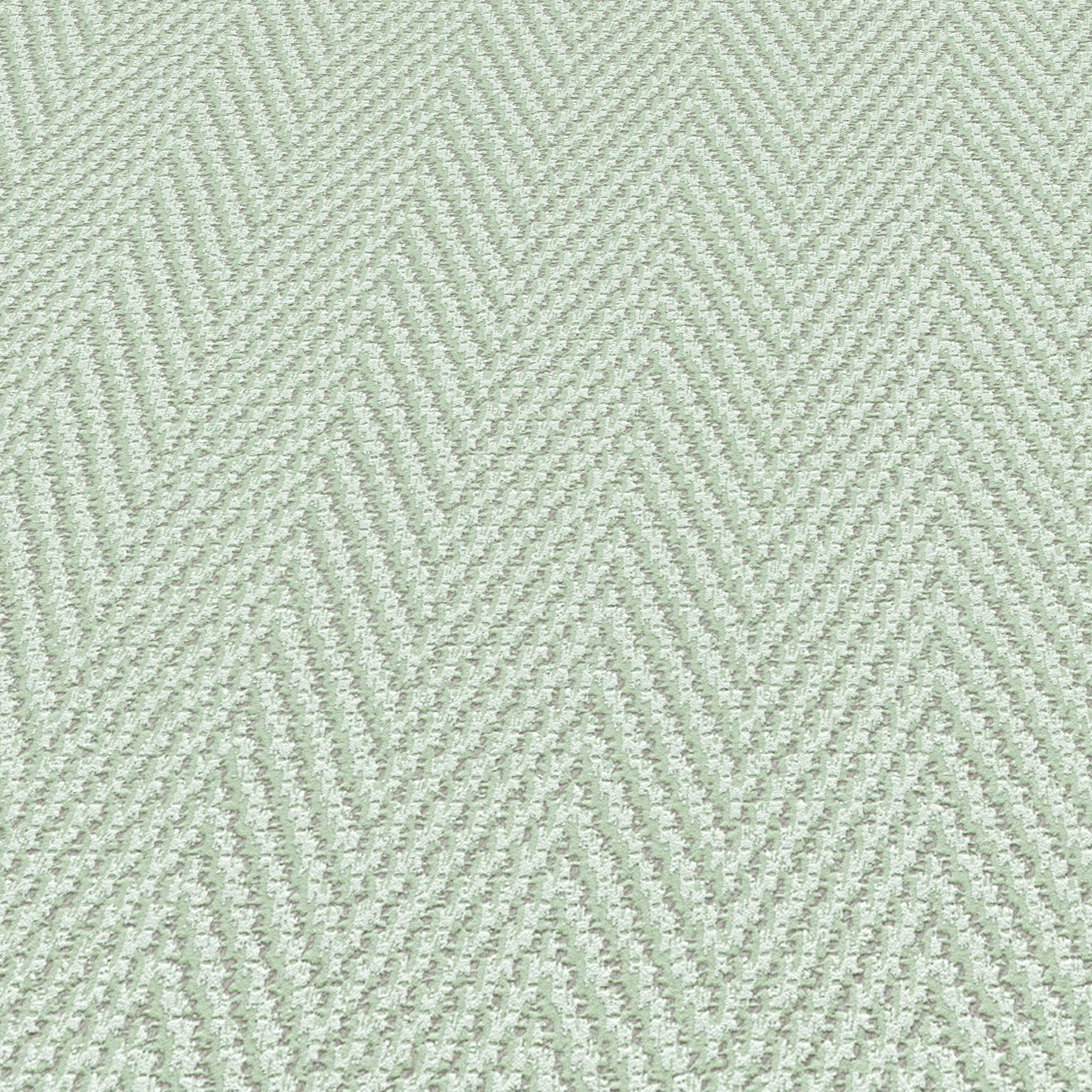 Light sage-green wallpaper with a subtle chevron stripe pattern and subtle texture.
