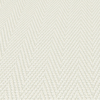 Cream wallpaper with a subtle chevron stripe pattern.