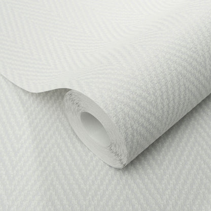 Gray chevron stripe textured wallpaper, rolled with the inner tube visible.