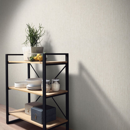 Beige wallpaper with artisan texture and traditional pattern.