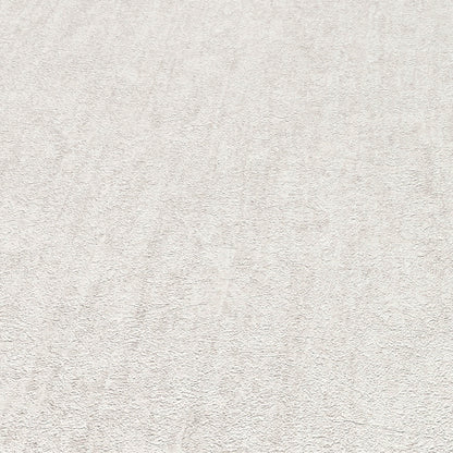 Beige textured wallpaper with cream tones and a subtle fiber-like pattern.