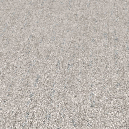 Light taupe textured wallpaper with subtle blue-gray specks.