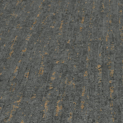 Dark gray wallpaper with scattered gold-tan flecks in a subtle textured pattern.