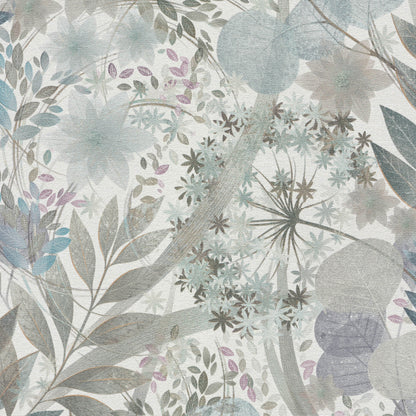 Pastel botanical wallpaper pattern with blue, gray and lavender leaves and blossoms on a textured background.
