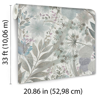 Rolled botanical wallpaper sample with muted blue-gray and beige florals and leafy pattern.