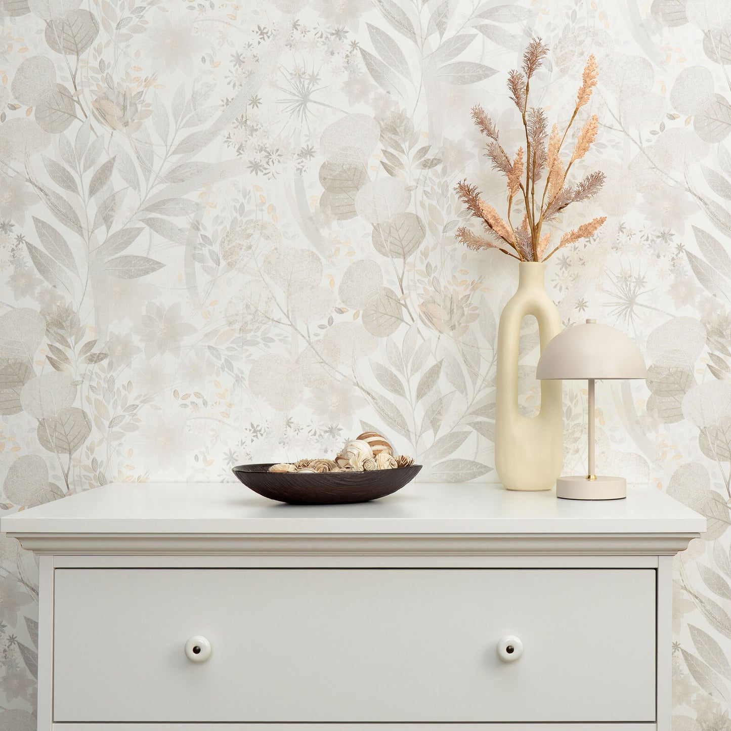 Pale gray wallpaper with a subtle floral botanical pattern in transitional gray tones.