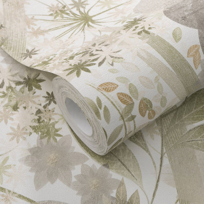 Roll of botanical wallpaper in soft beige and sage green with leafy floral pattern; natural, calming decor.