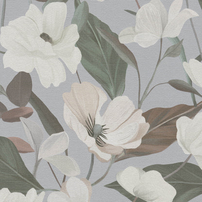 Textured wallpaper featuring large cream flowers and green leaves on a cool gray-blue background.
