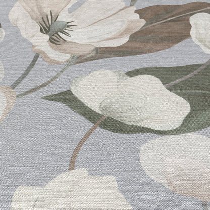 Cream flower petals with green leaves on a pale blue-gray textured background; floral wallpaper pattern.