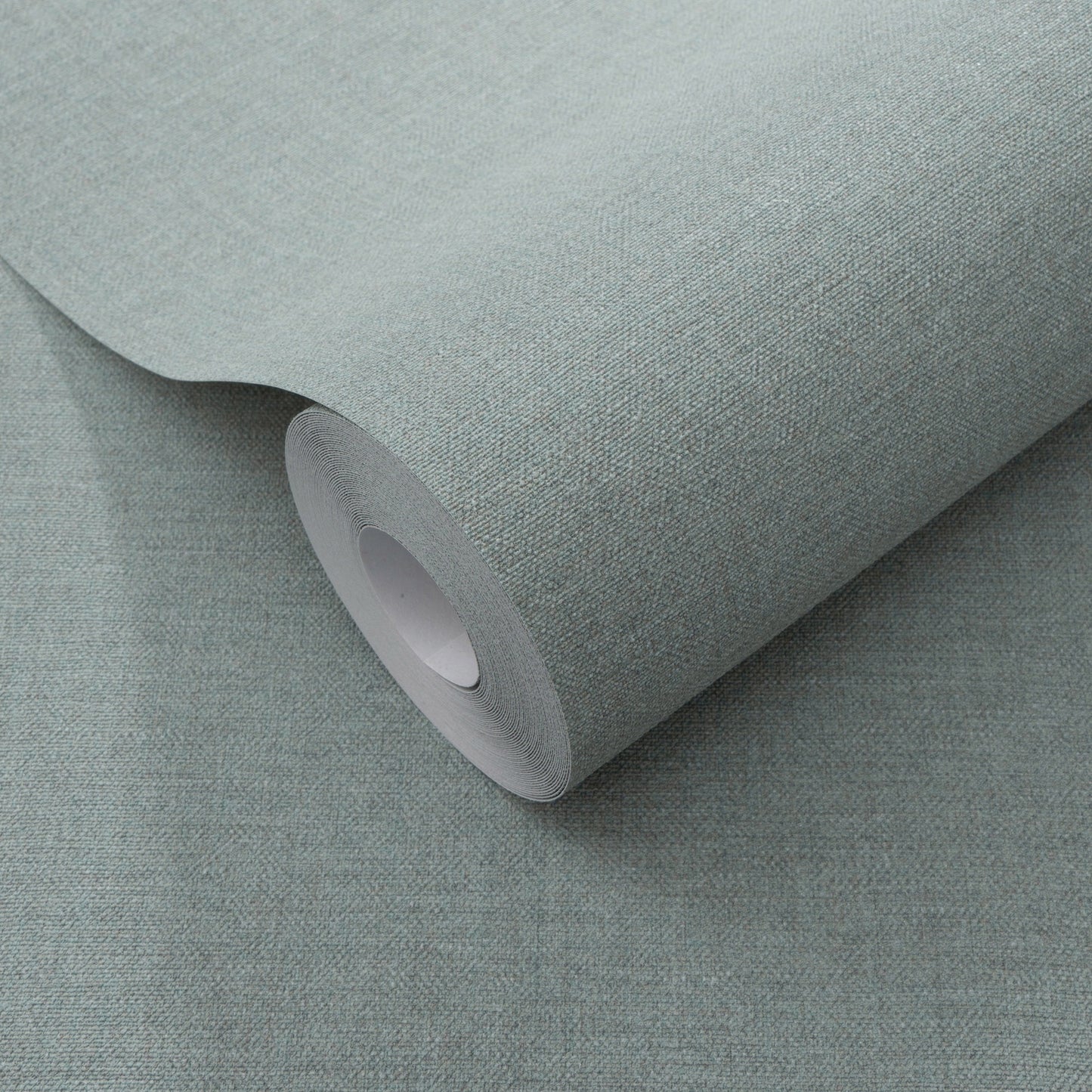 Roll of teal wallpaper with a subtle linen-like texture.