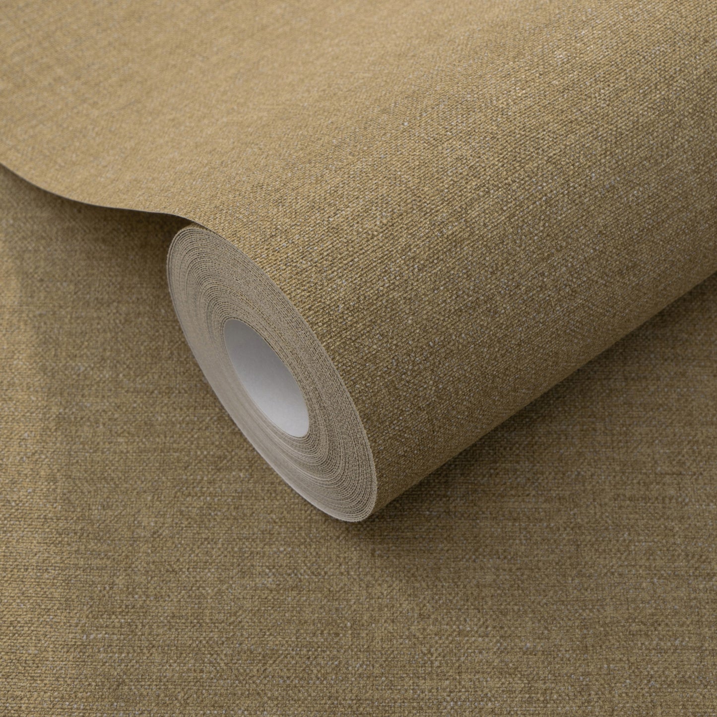 Yellow linen-look wallpaper on a roll with a subtle textured surface and a traditional pattern.