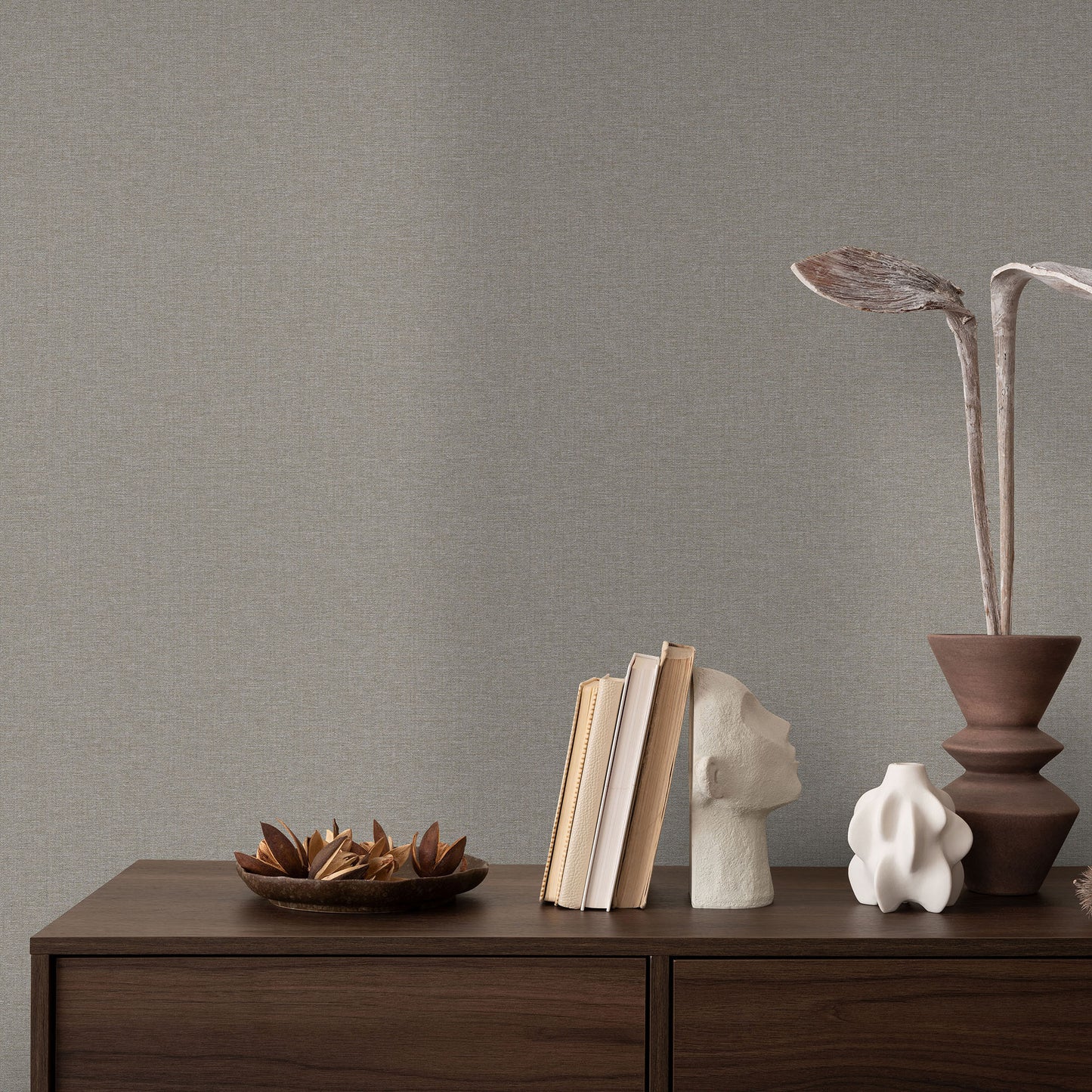 Dark gray wallpaper with a subtle linen texture and traditional pattern.