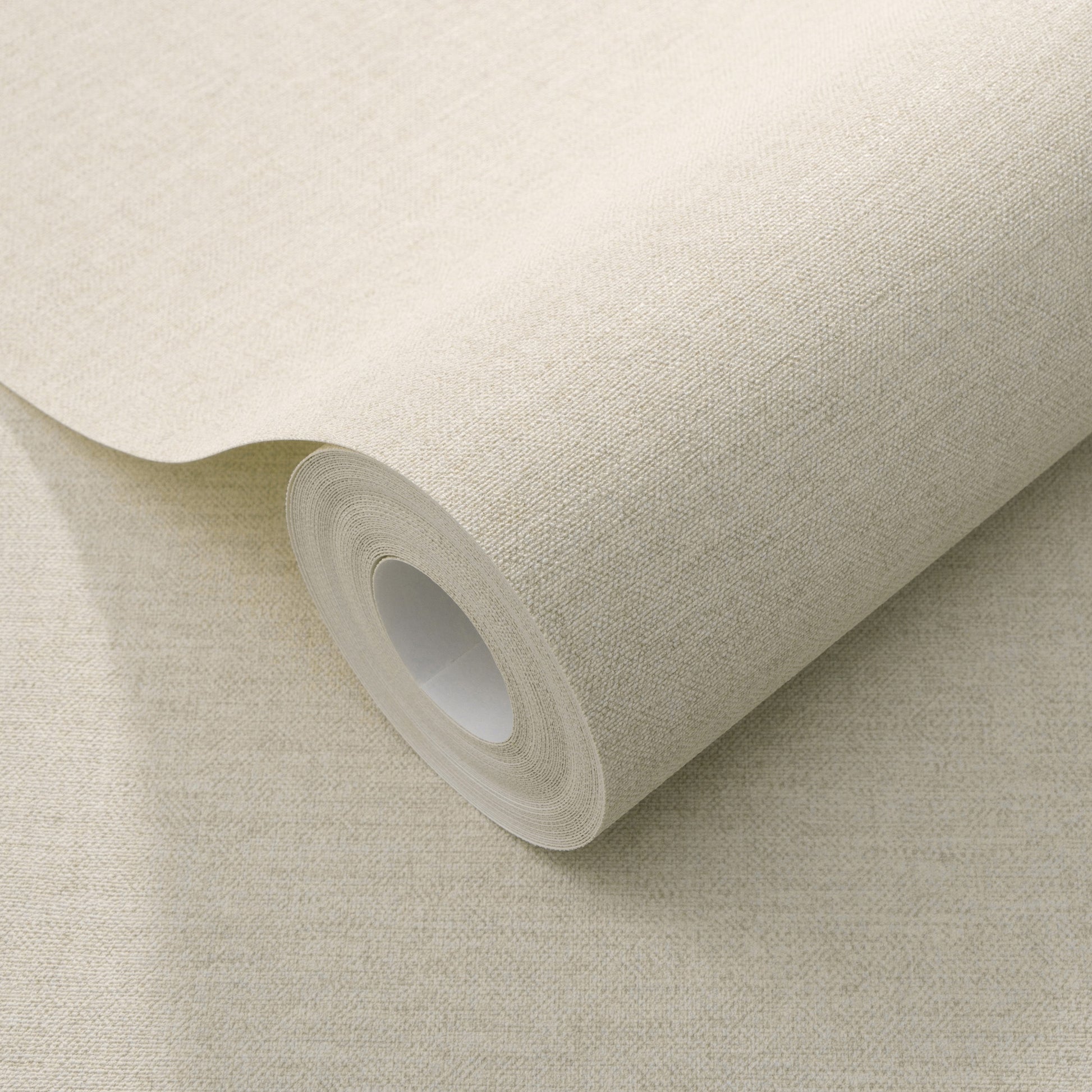 Off-white wallpaper roll with linen-textured surface and curled edge.