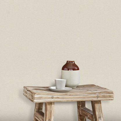 Off-white wallpaper with a subtle linen texture and traditional pattern.