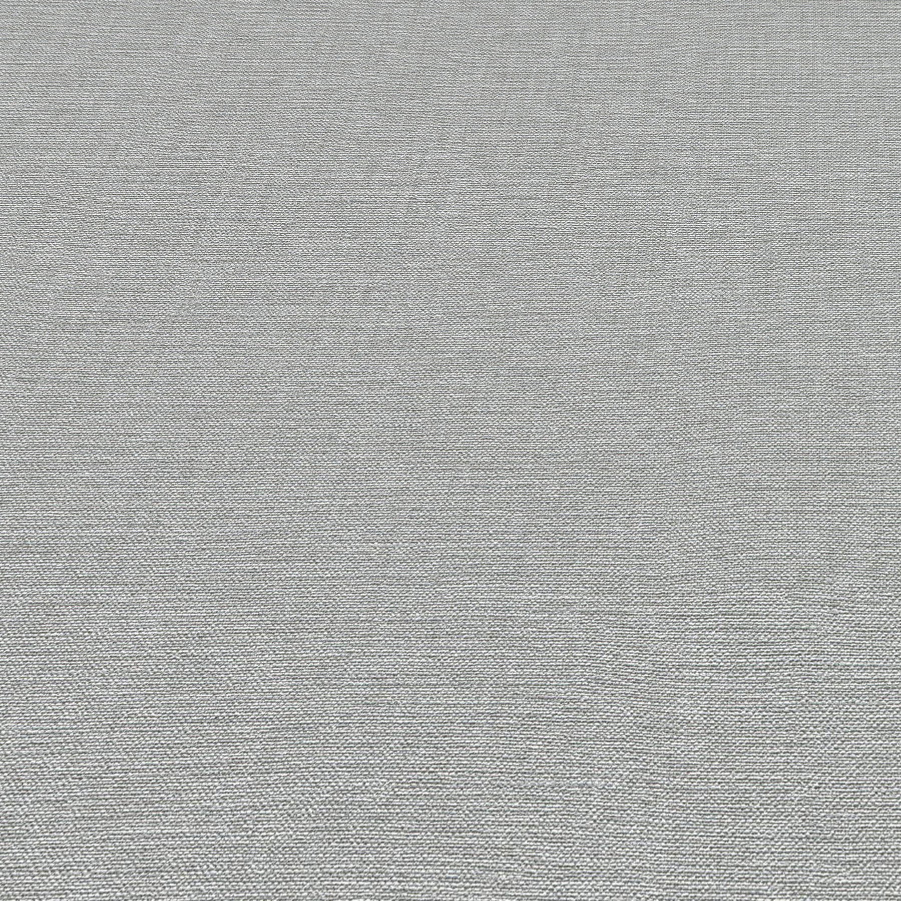 Blue linen-textured wallpaper with a subtle woven pattern.