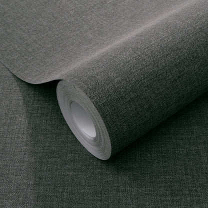 Dark grey textured wallpaper with a linen-like weave pattern.