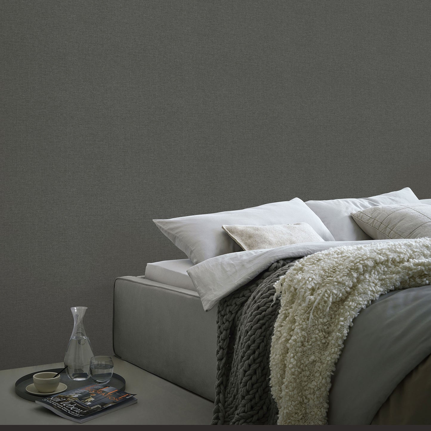Black traditional wallpaper with a linen-textured pattern.