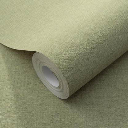 Sage-green textured wallpaper roll with linen-like weave and cardboard core.