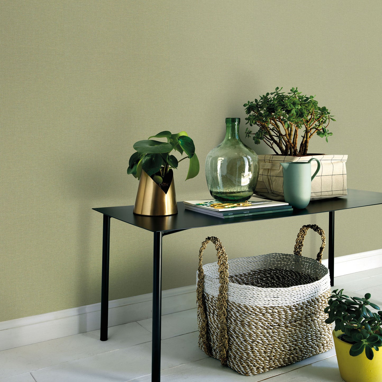 Sage wallpaper with a traditional pattern on the wall.