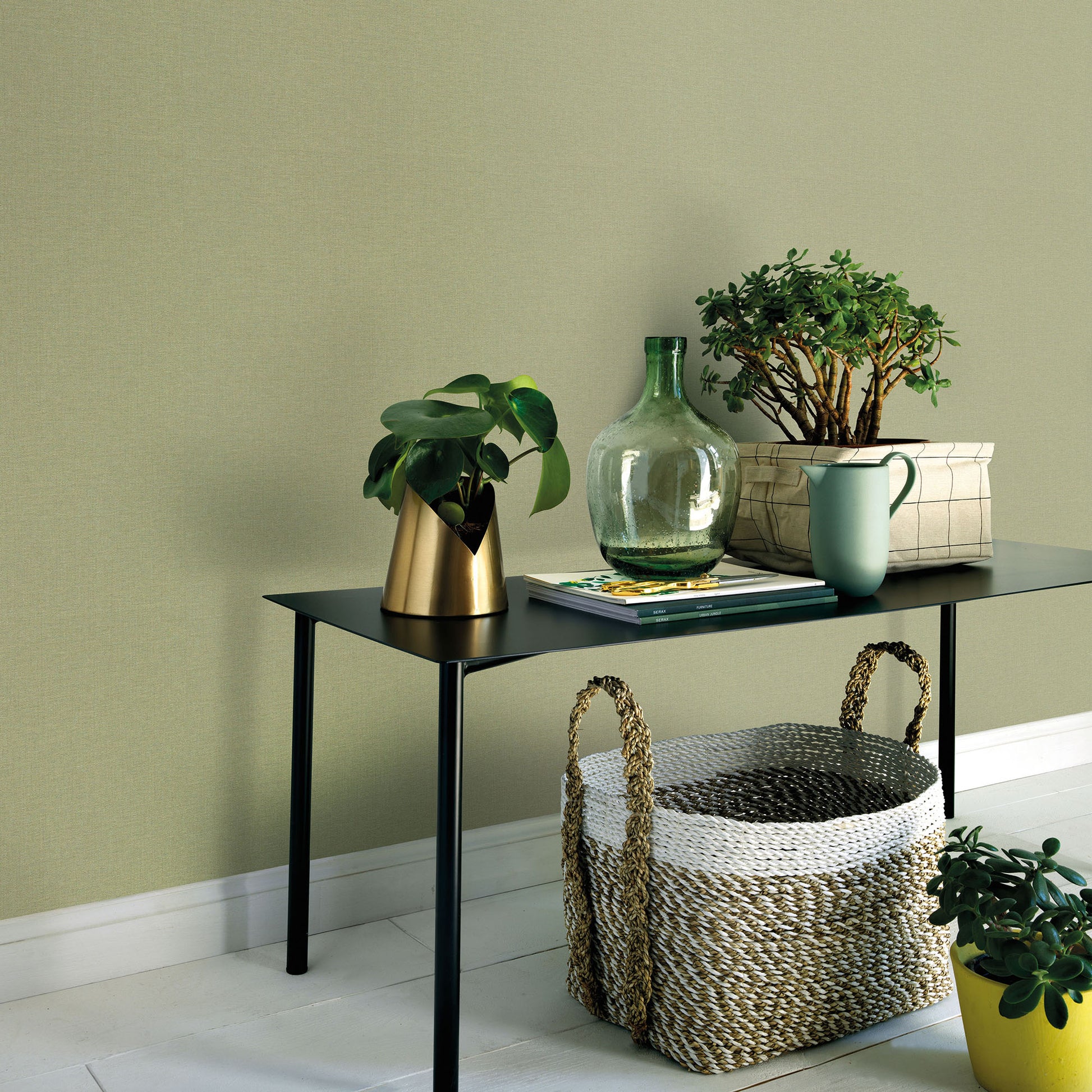 Sage wallpaper with a traditional pattern on the wall.