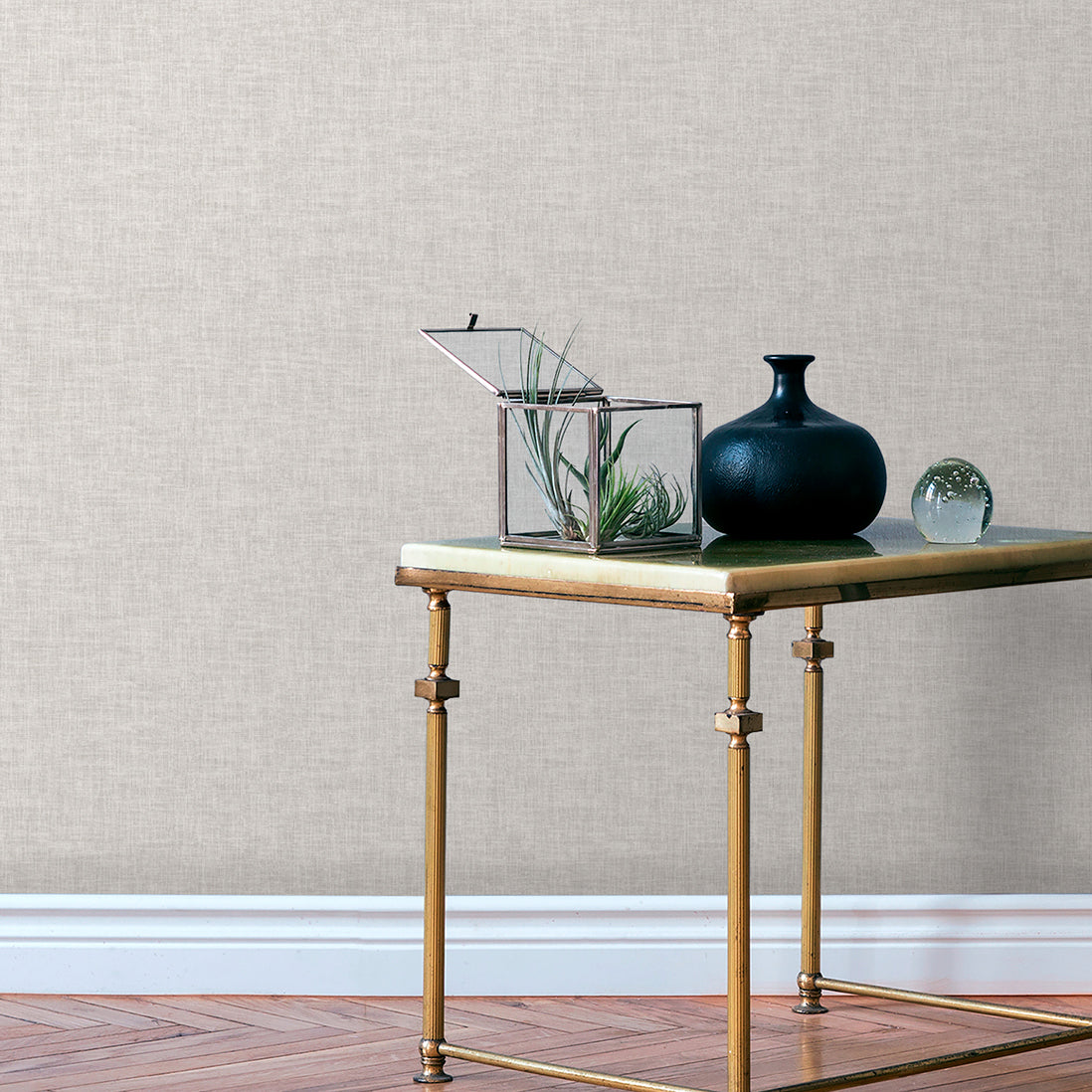 Light gray wallpaper with linen-weave texture; contemporary modern pattern.