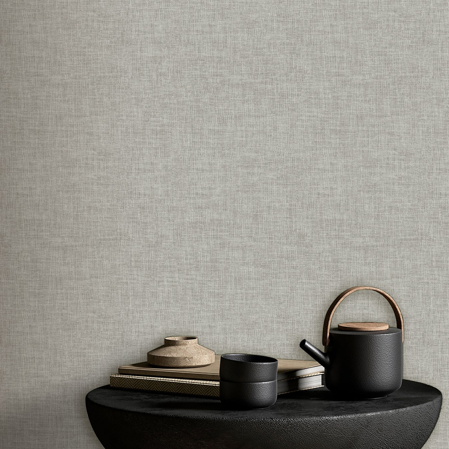 Gray linen-weave textured wallpaper swatch.