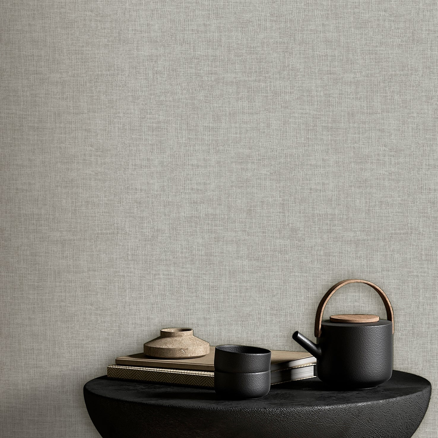 Gray linen-weave textured wallpaper swatch.