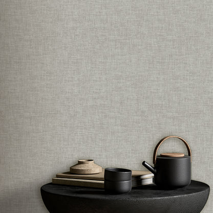 Gray linen-weave textured wallpaper swatch.