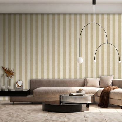 Sage linen-striped wallpaper on a wall in a modern living room; neutral sofa and cushions, glass coffee table visible.