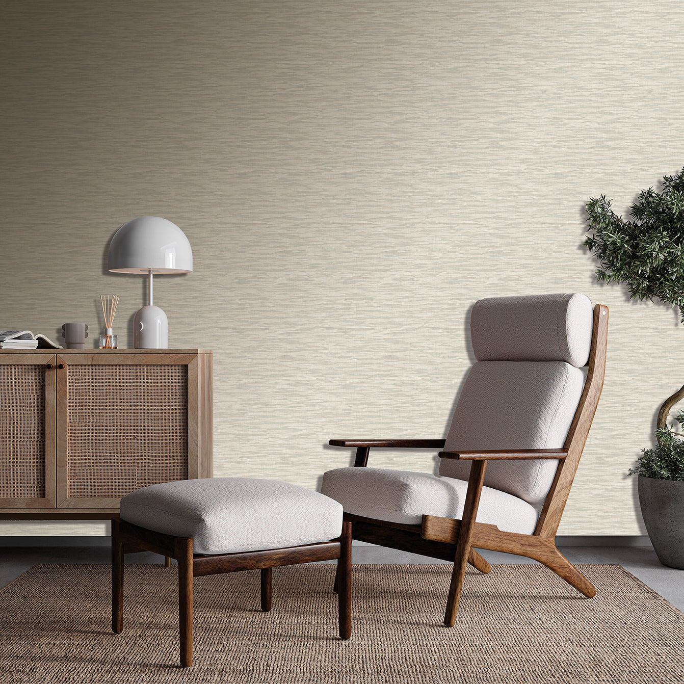 Mid-century wooden lounge chair with matching ottoman and light gray cushions in a cozy living room.