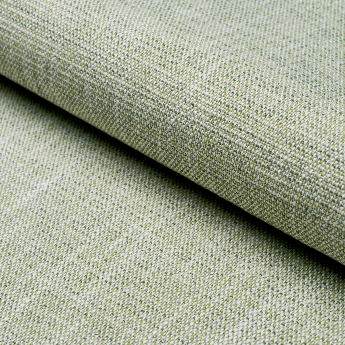 Sage green Lily Indoor/Outdoor 84225 fabric by Schumacher — UV-resistant, water- and stain-resistant upholstery fabric ideal for outdoor furniture, patio cushions, indoor seating or pillows