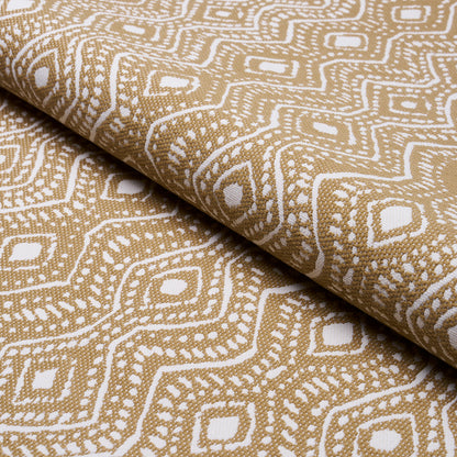 Beige fabric with white geometric diamond pattern, rolled textile suitable for upholstery, crafts, or drapery.