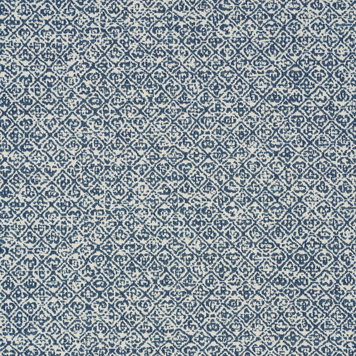 Indigo and cream woven fabric with geometric diamond lattice and distressed look; indoor/outdoor woven.