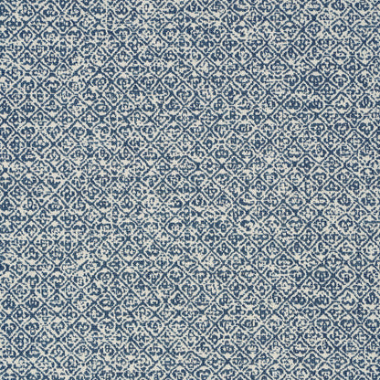 Indigo and cream woven fabric with geometric diamond lattice and distressed look; indoor/outdoor woven.